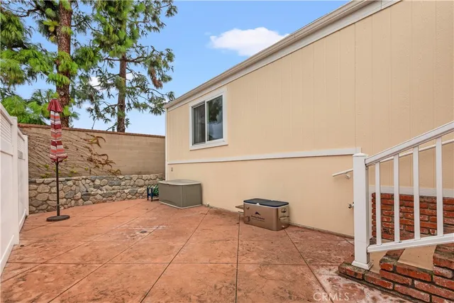 a view of house with backyard and entertaining space