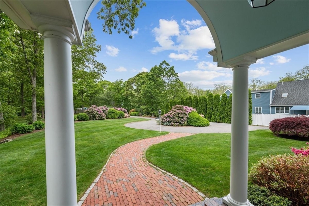 89 Standish Road Bourne, MA 02562 - Photo 5 of 39 a view of a house with a yard