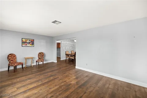 a view of a livingroom with furniture and wooden floor