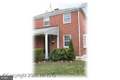 3911 Brookhill Road Baltimore, MD 21215 - Photo 1 of 1 a view of a house with a yard