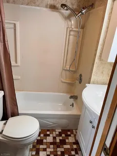 a bathroom with a sink and a toilet