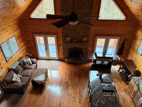 5575 Rainbow Springs Road Franklin, NC 28734 - Photo 19 of 35 a living room with furniture or fireplace and a wooden floor