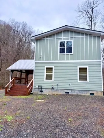 a backyard of a house with trees