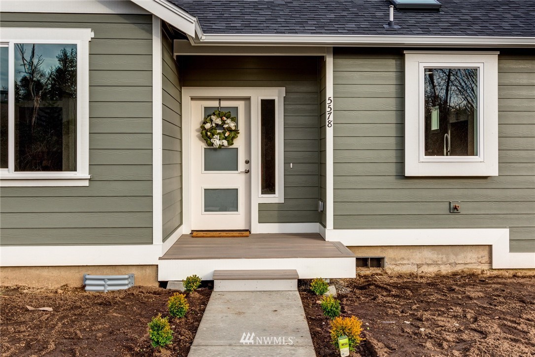 5578 South Church Road Ferndale, WA 98248 - Photo 5 of 36 a front view of a house with a yard