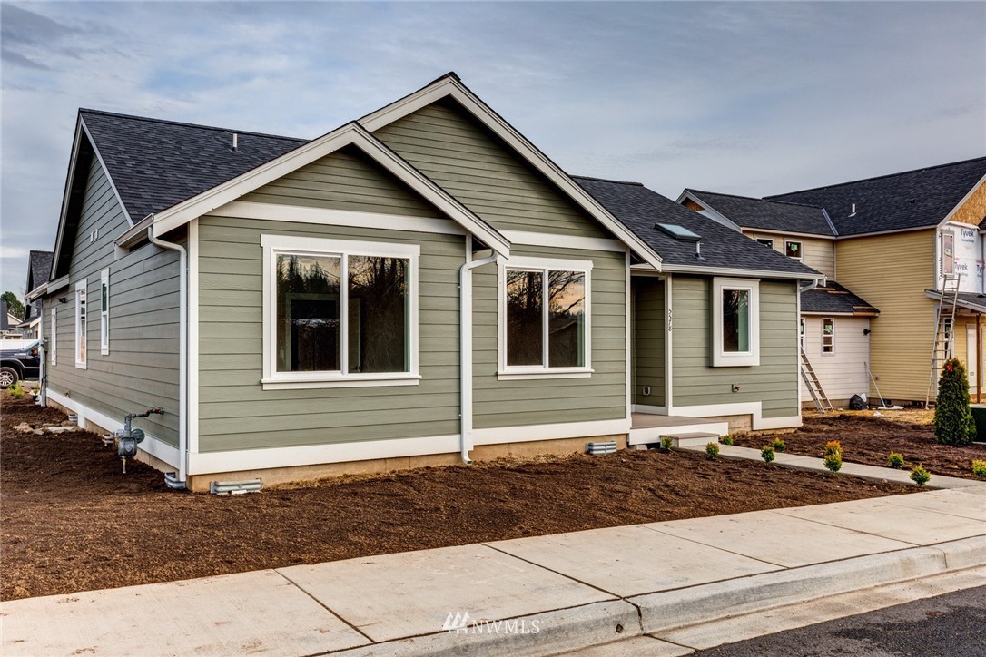 5578 South Church Road Ferndale, WA 98248 - Photo 7 of 36 a front view of a house with a yard
