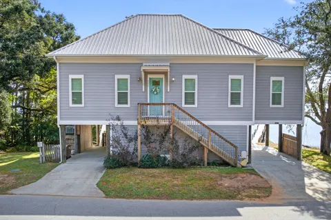 a front view of a house with swimming pool
