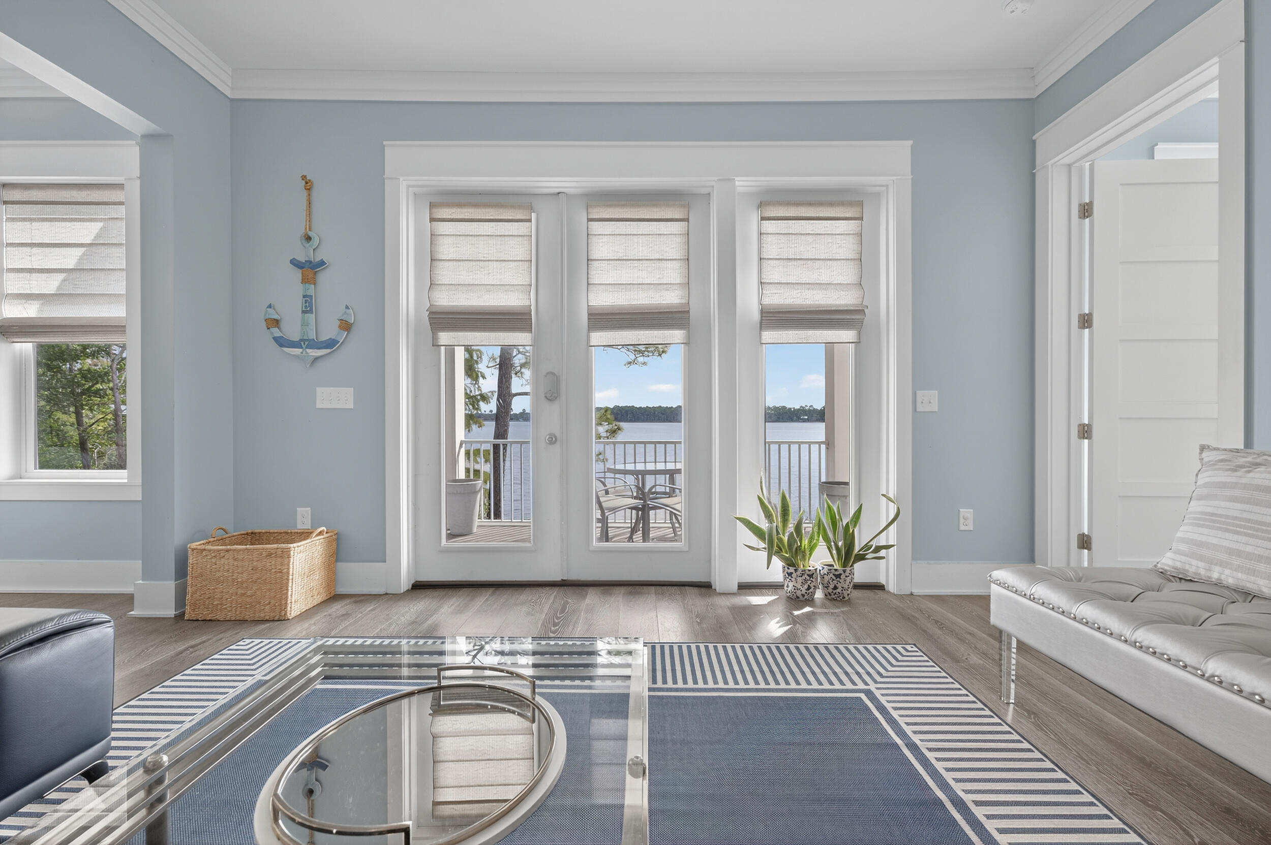 2975 Holley Point Road Navarre, FL 32566 - Photo 25 of 101 a living room with furniture and a potted plant