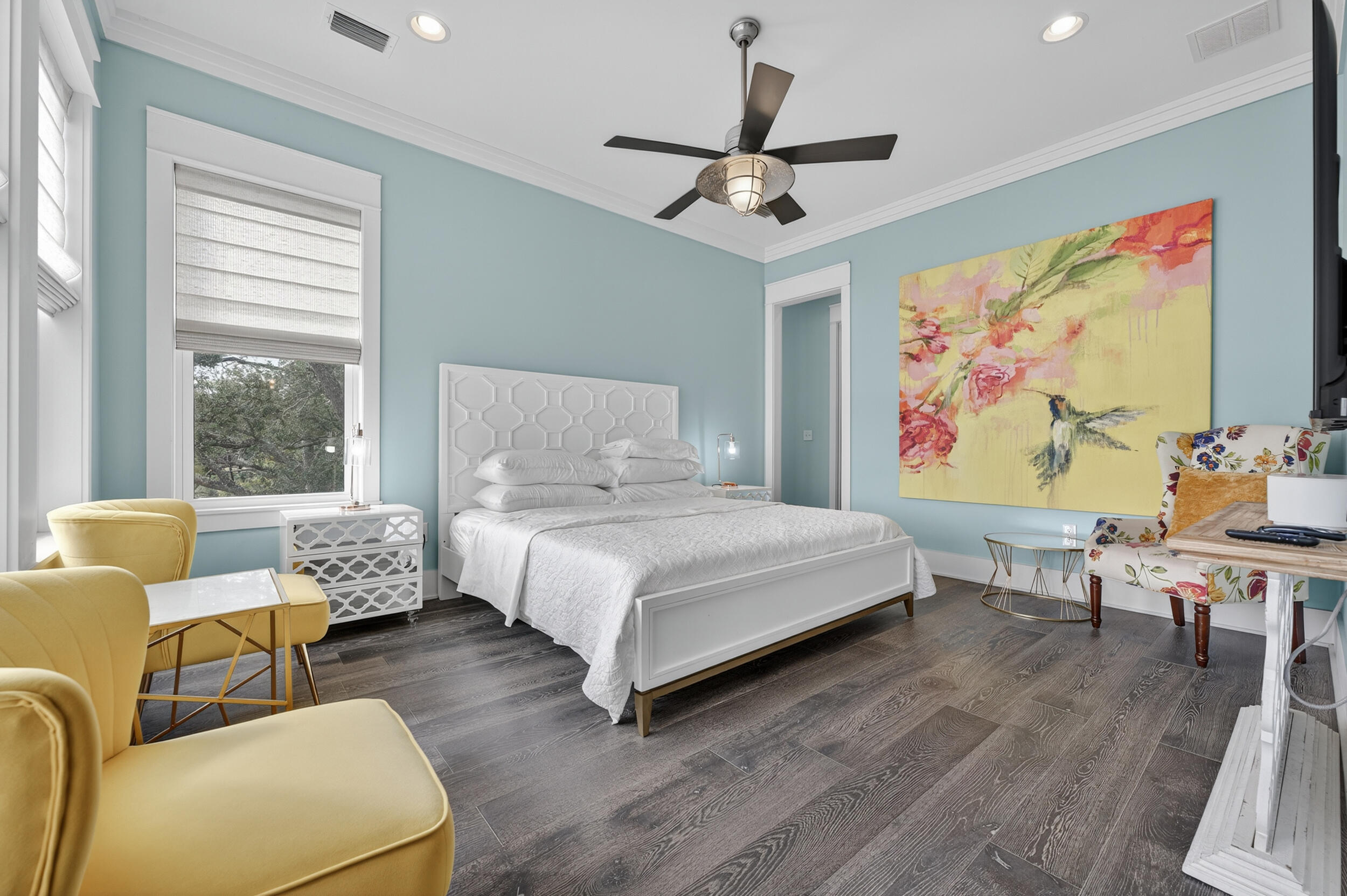 2975 Holley Point Road Navarre, FL 32566 - Photo 42 of 101 a bedroom with a bed couches and painting on the wall