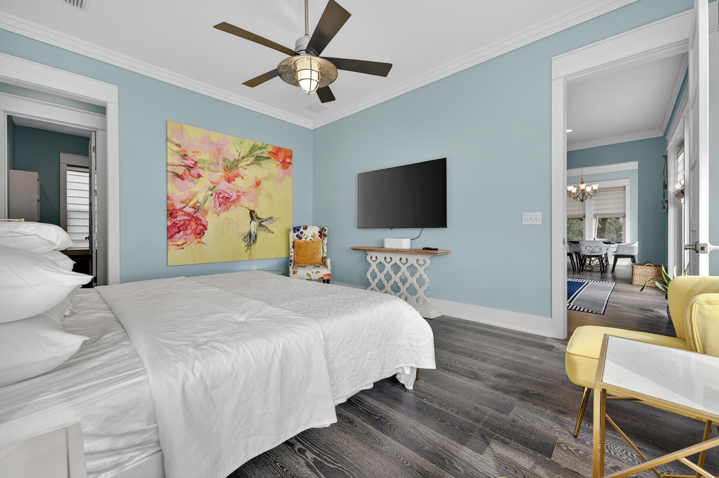 2975 Holley Point Road Navarre, FL 32566 - Photo 43 of 101 a bedroom with a bed and a flat screen tv