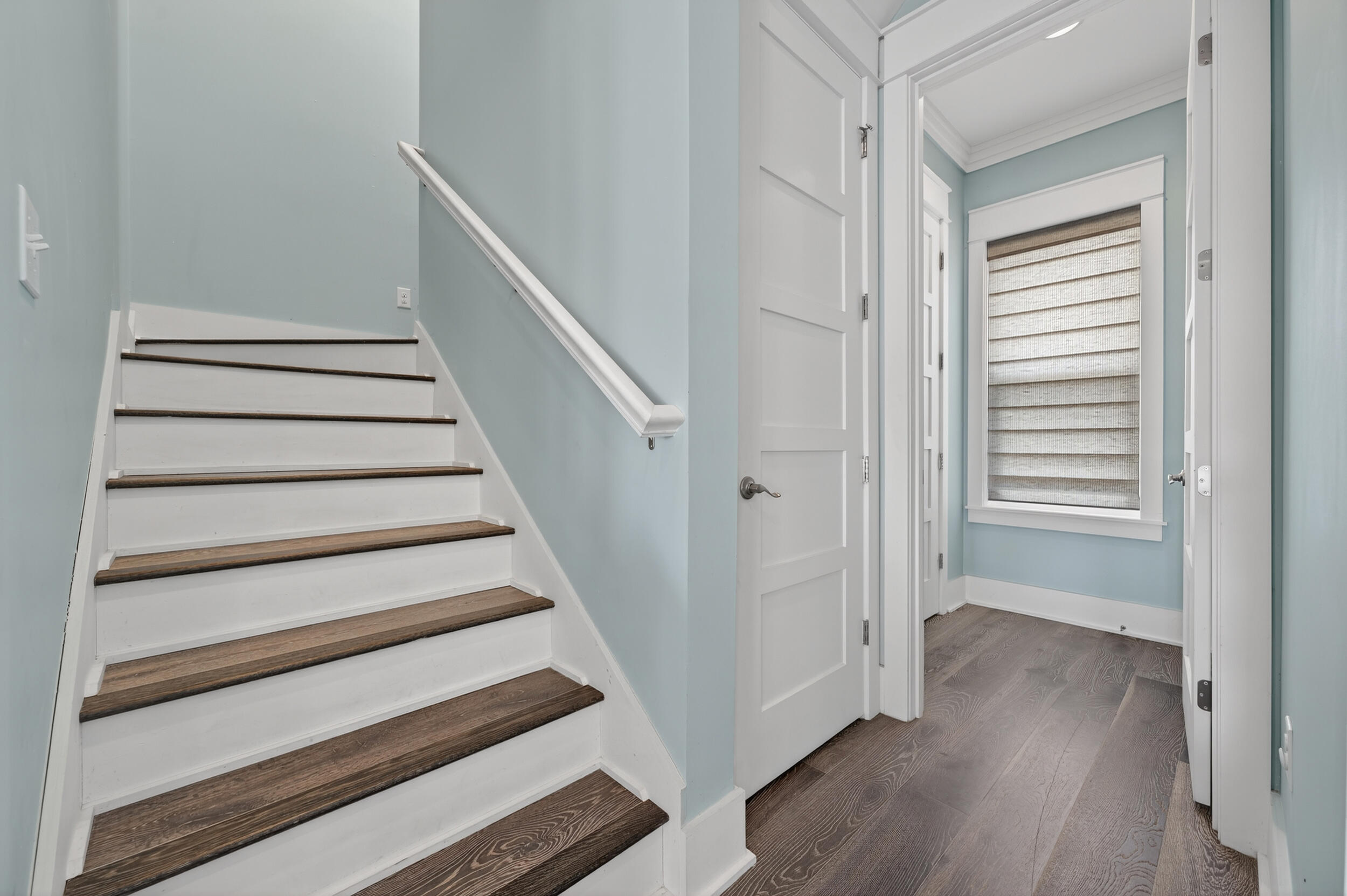 2975 Holley Point Road Navarre, FL 32566 - Photo 55 of 101 a view of a hallway with wooden floor and entryway