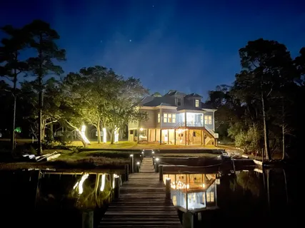 a view of a chair and table in the balcony