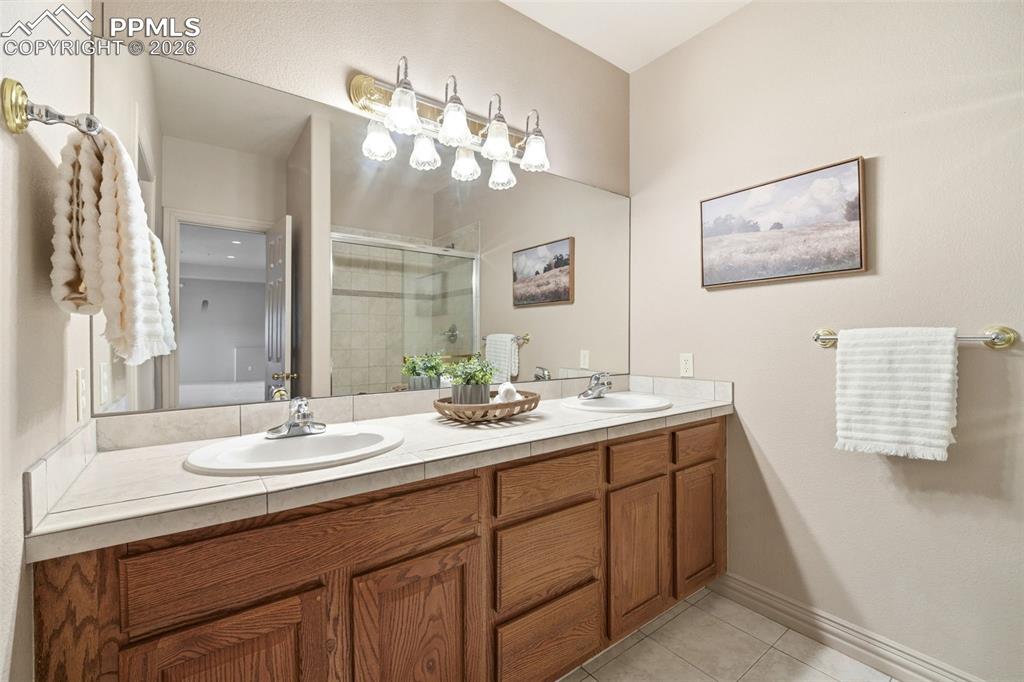 10350 Hodgen Road Colorado Springs, CO 80908 - Photo 28 of 49 Basement Bathroom