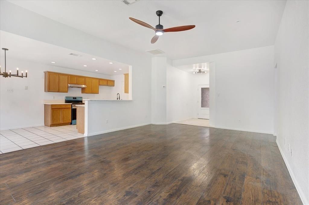 700 East 6th Street Bonham, TX 75418 - Photo 11 of 28 a view of a kitchen with a sink and a kitchen counter top space