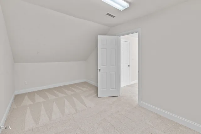 an empty room with an entryway