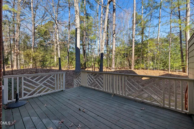 a view of balcony with wooden floor