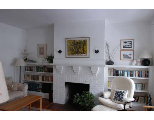 36 Linnaean Street, Unit 1 Cambridge, MA 02138 - Photo 2 of 2 a living room with furniture and a fireplace