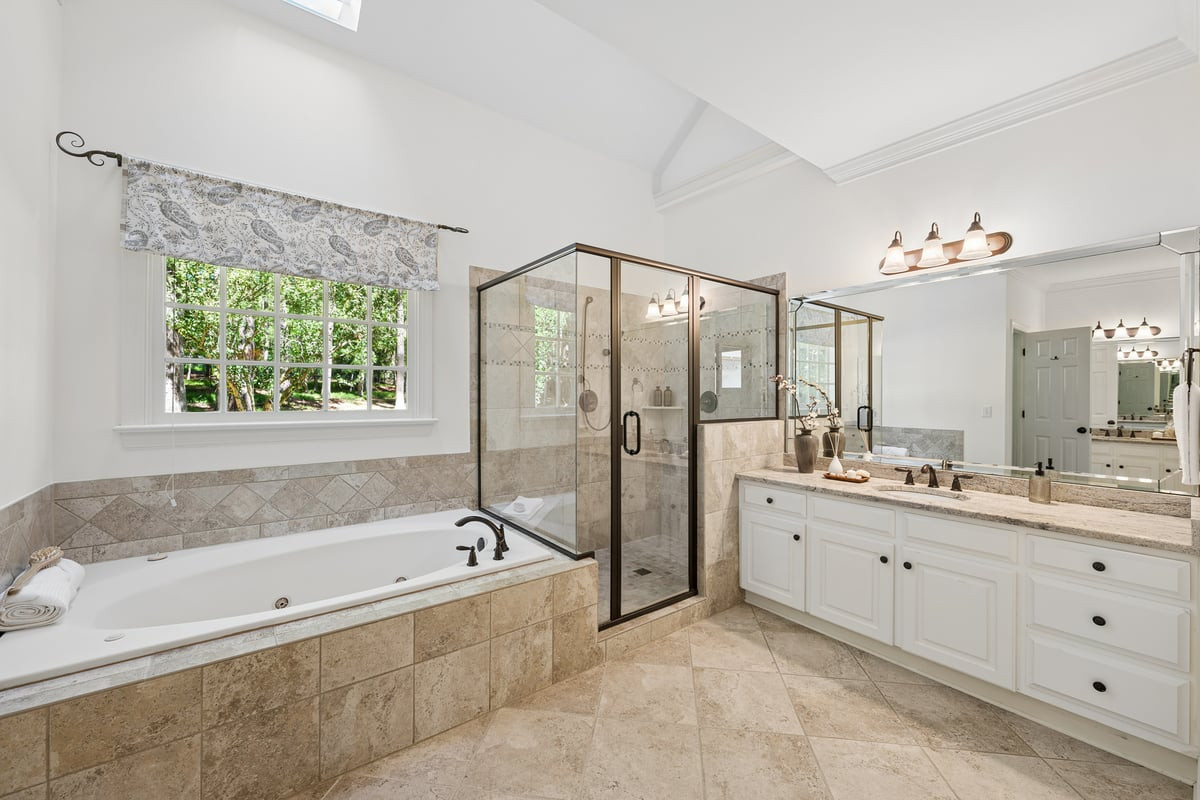 1008 Broken Sound Way Raleigh, NC 27614 - Photo 23 of 51 Primary bathroom with shower and tub.