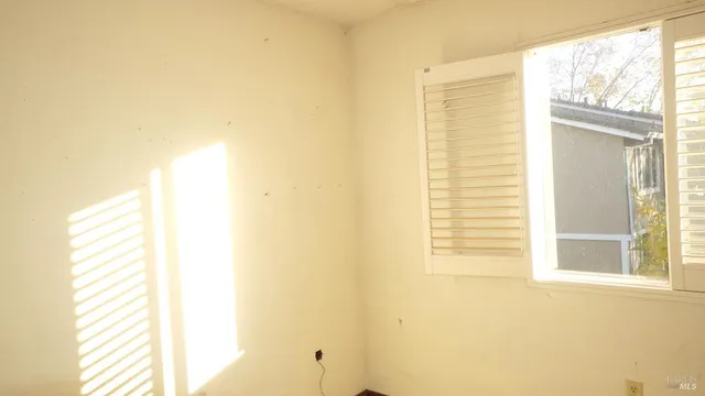 a view of a room with a hallway