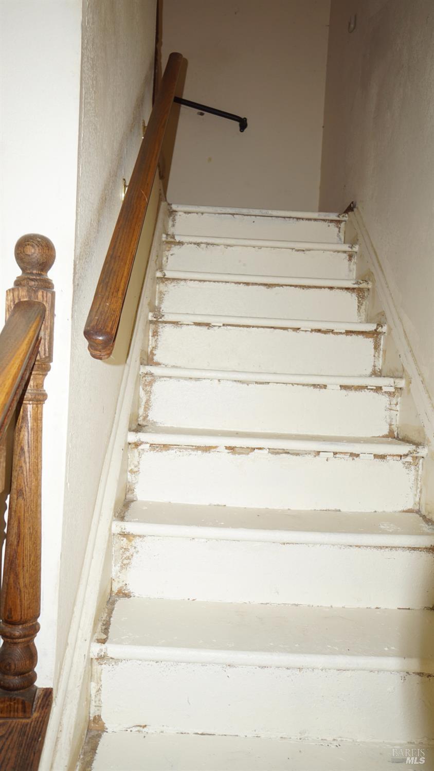 522 Santa Alicia Drive Rohnert Park, CA 94928 - Photo 22 of 24 a view of staircase with white walls and a window