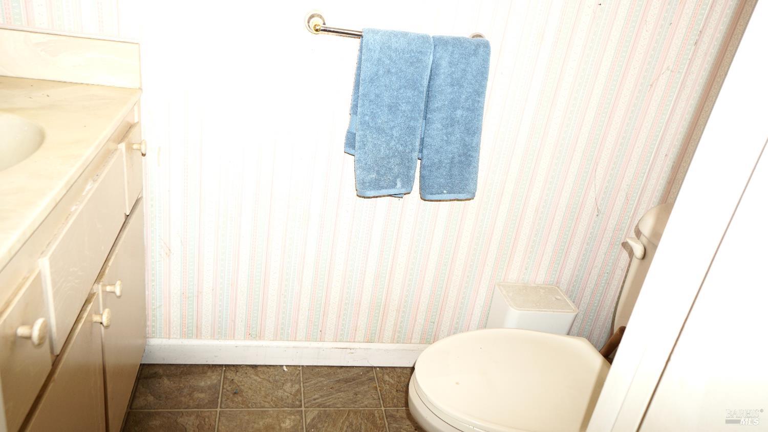 522 Santa Alicia Drive Rohnert Park, CA 94928 - Photo 23 of 24 a bathroom with a toilet and a shower curtain