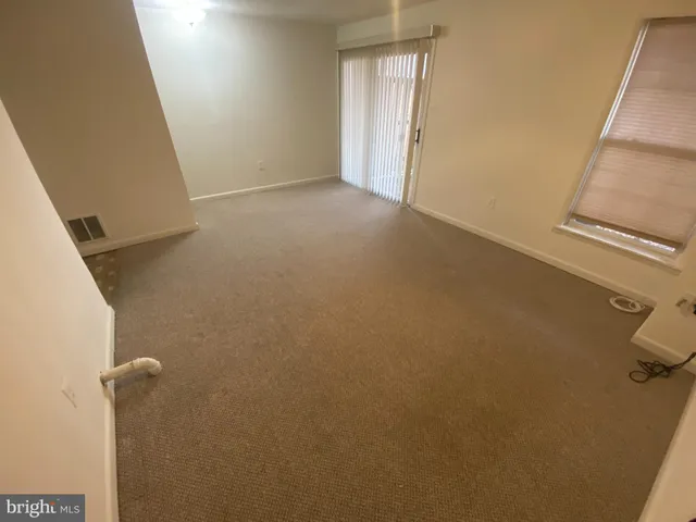 a view of a room with rack on the wall