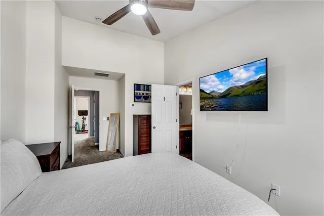 a bathroom with a shower curtain and a sink