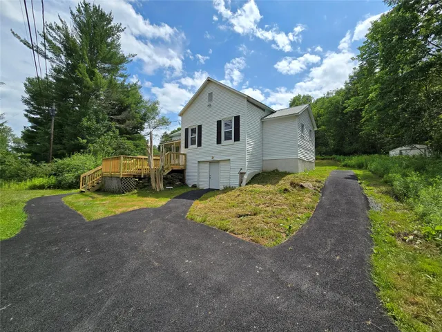 a house view with a garden space