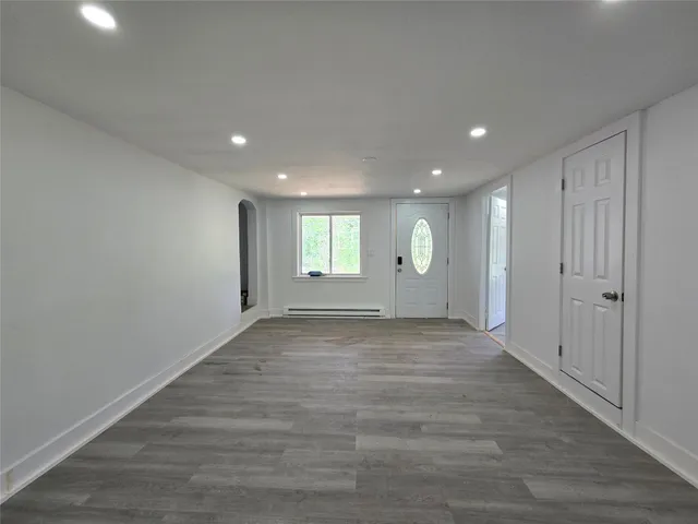a view of an empty room and window