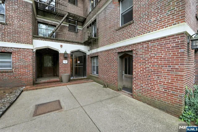 a front view of a building with glass door