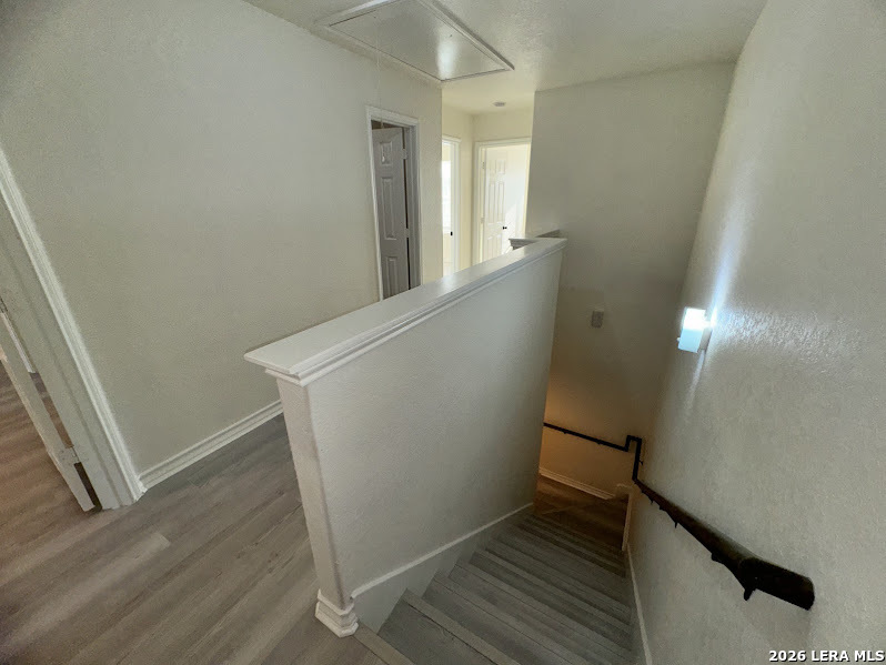 16808 Dancing Ava, Unit 2 Selma, TX 78154 - Photo 7 of 15 a view of hallway with wooden floor