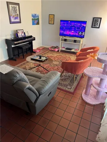 a bedroom with a bed and a desk