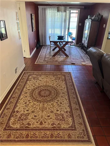 a view of a living room with furniture