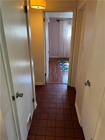 a bathroom with a glass door shower