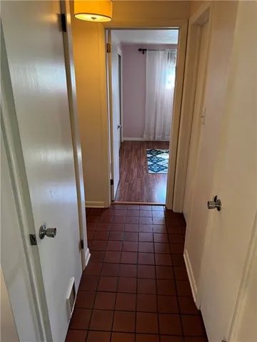 a bathroom with a glass door shower