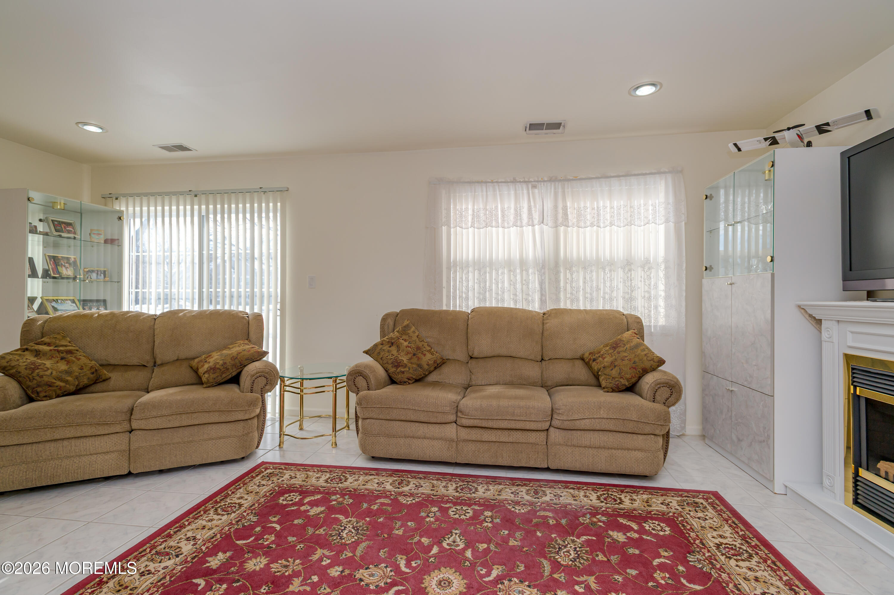 159 Dorado Beach Court Howell, NJ 07731 - Photo 14 of 25 LivRm with Sliders to Patio