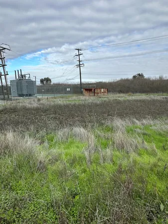 a view of a lake with a big yard
