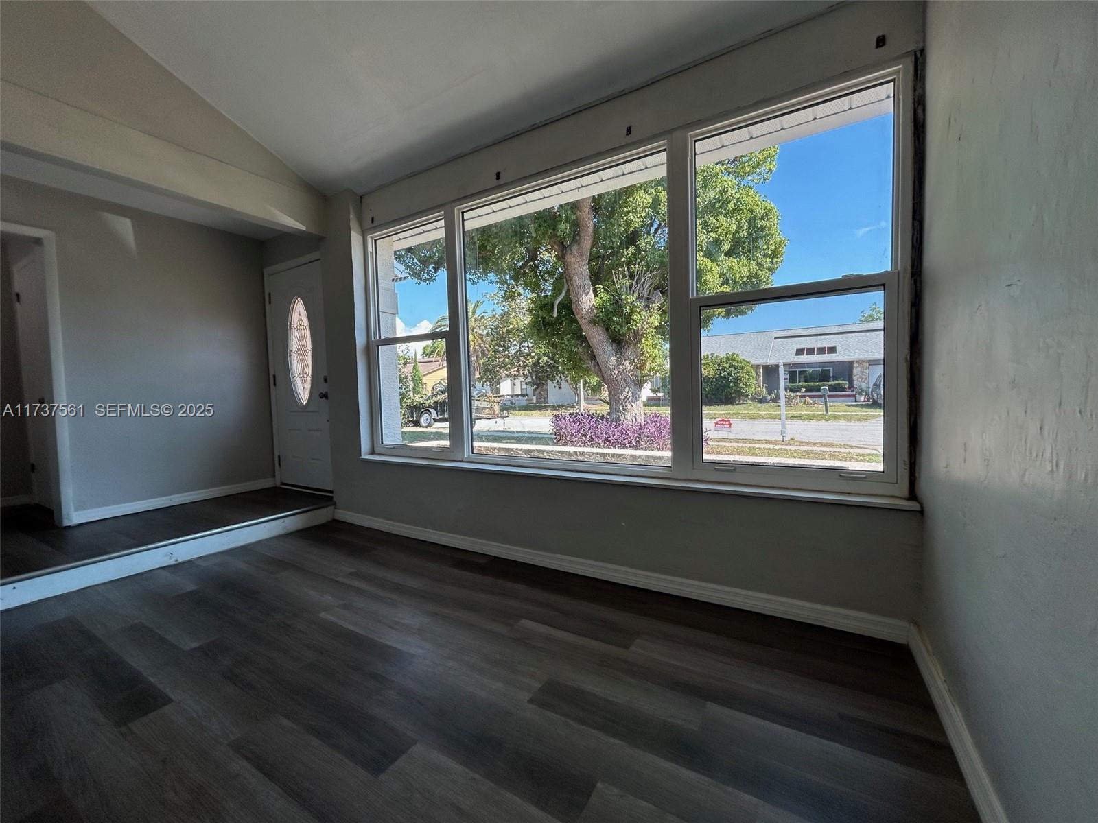 7403 Foxbloom Drive Port Richey, FL 34668 - Photo 40 of 45 a view of an empty room with a window