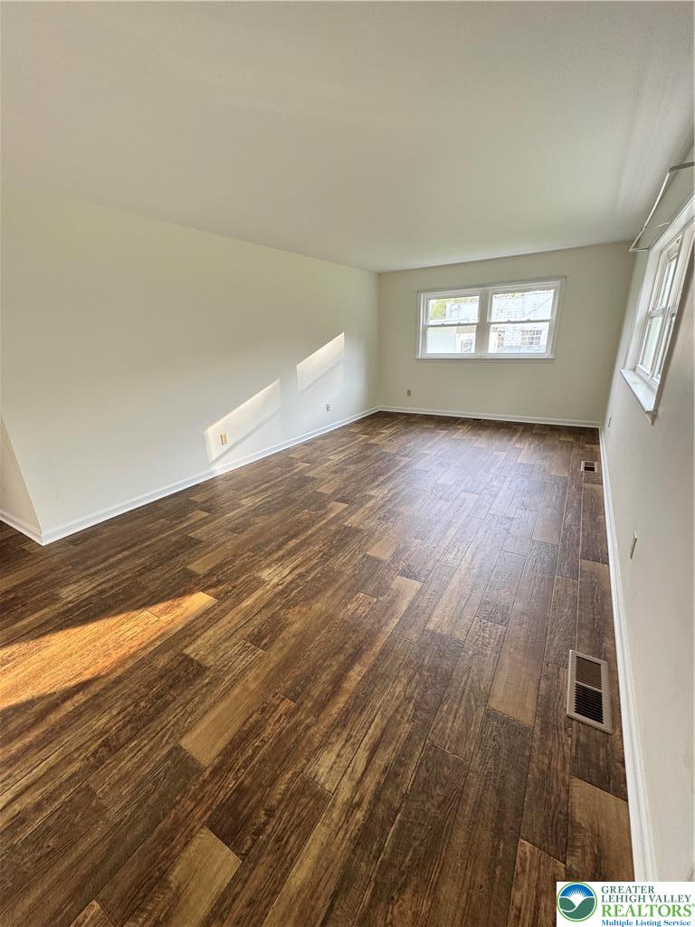 5460 Interchange Road Lehighton, PA 18235 - Photo 7 of 22 wooden floor in an empty room with a window