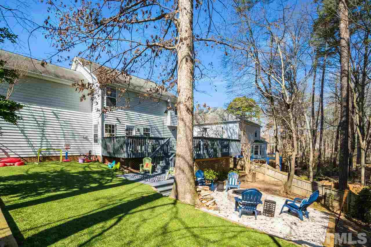 8727 Harps Mill Road Raleigh, NC 27615 - Photo 23 of 25 a view of yard with patio
