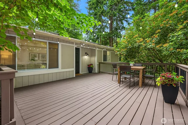 a view of a house with sitting area and wooden floor