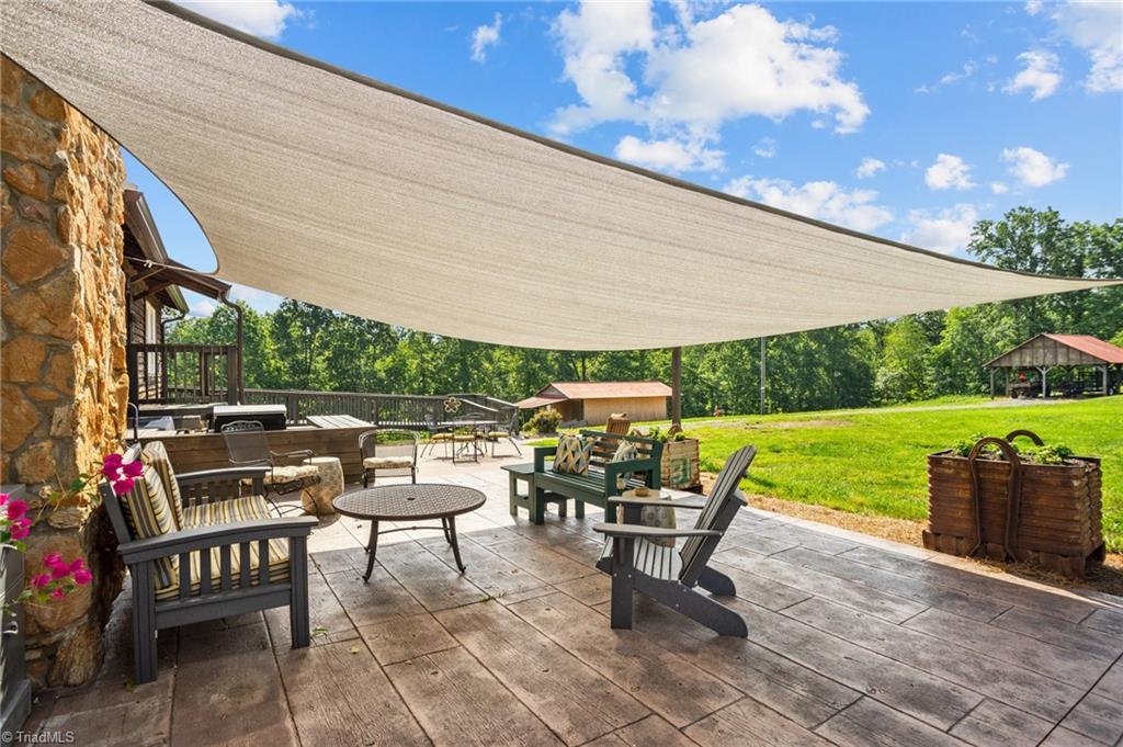 327 Tobacco Road Madison, NC 27025 - Photo 41 of 50 Patio with shade