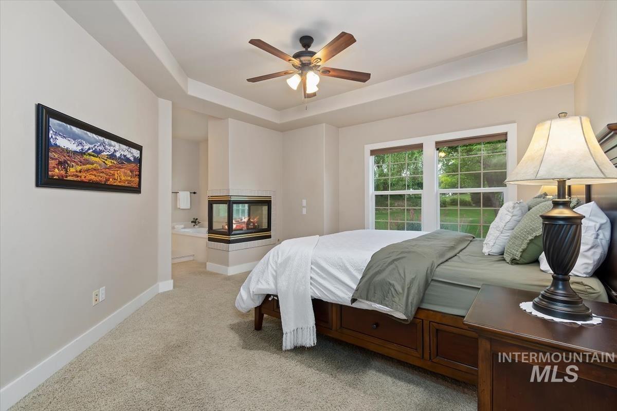 10462 West Lanktree Gulch Road Star, ID 83669 - Photo 17 of 48 Tray ceiling with ceiling fan and recessed lighting