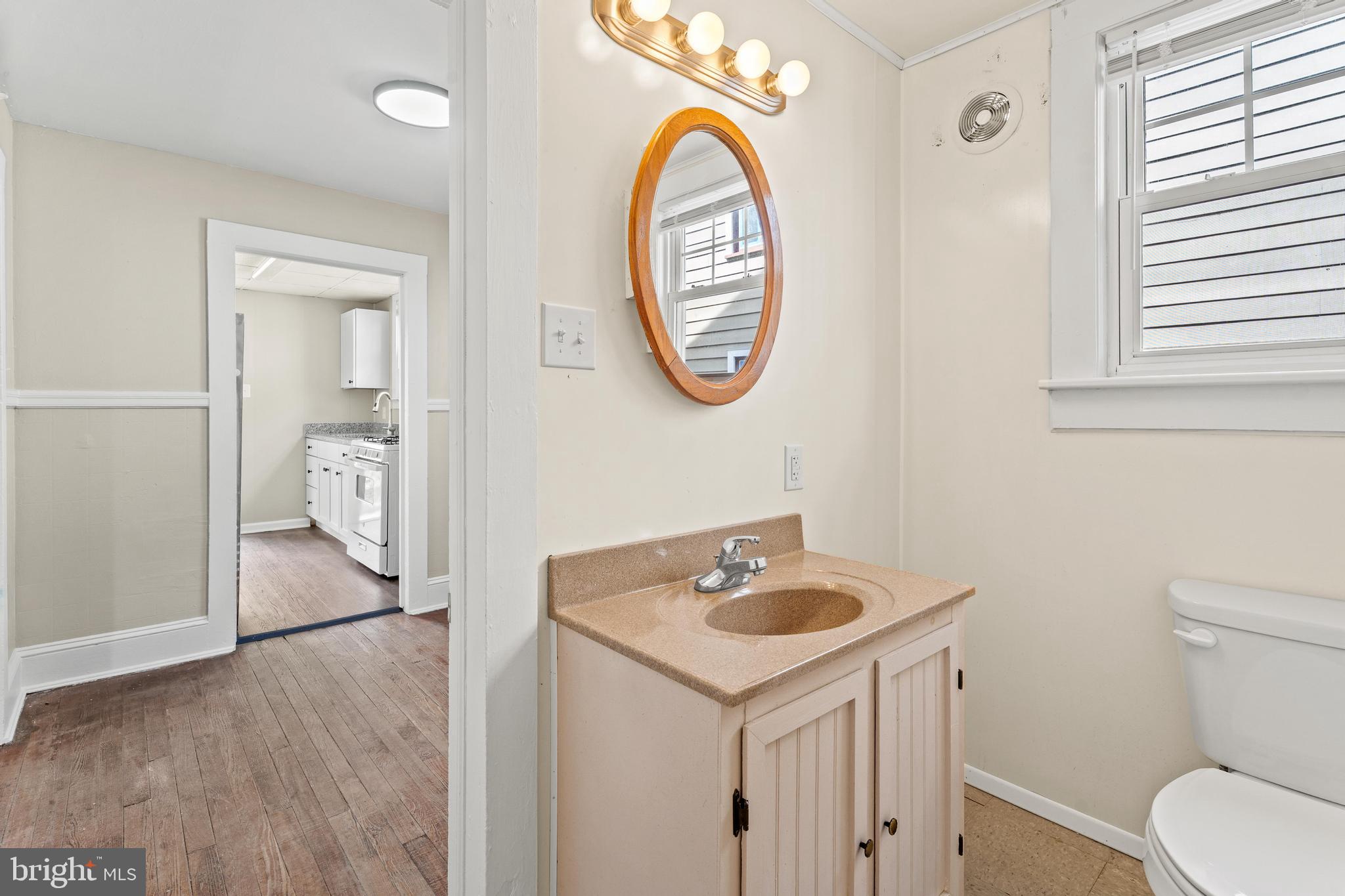 225 Broad Street Salisbury, MD 21801 - Photo 12 of 25 Charming bathroom with modern touches.