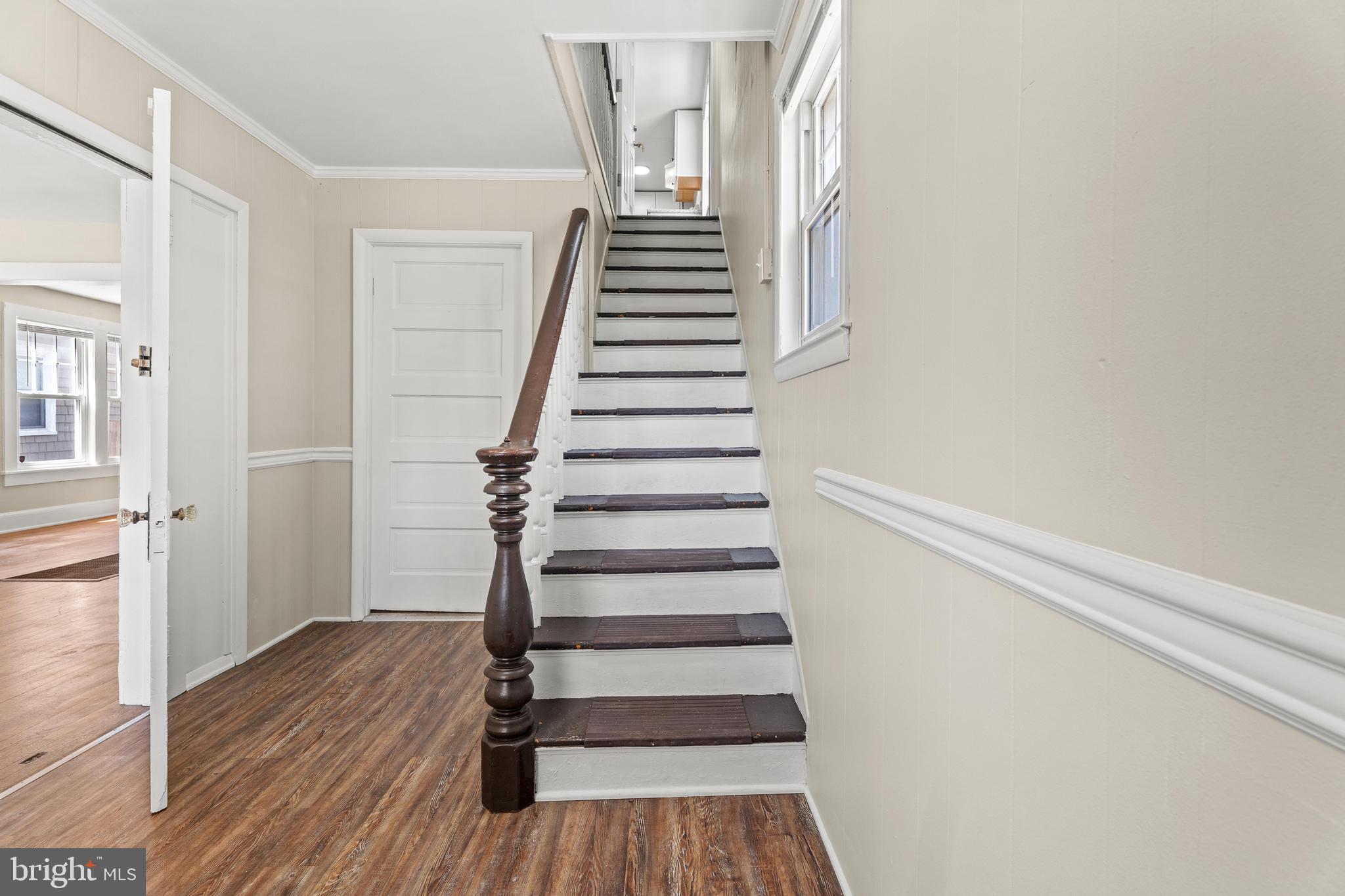 225 Broad Street Salisbury, MD 21801 - Photo 13 of 25 Inviting staircase in a bright foyer.