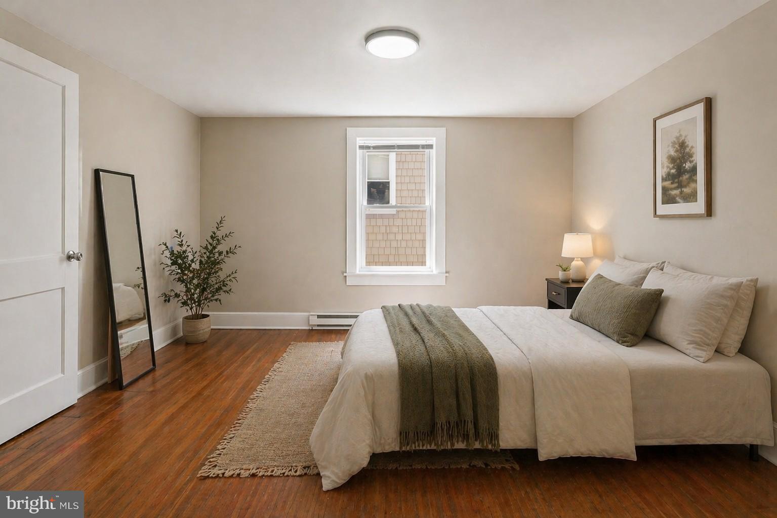 225 Broad Street Salisbury, MD 21801 - Photo 17 of 25 Serene bedroom with natural light.