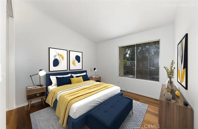 a bedroom with a bed and a walk in closet