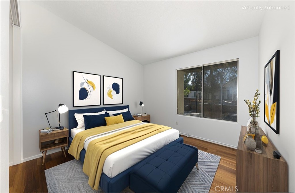 1800 East Old Ranch Road, Unit 134 Colton, CA 92324 - Photo 13 of 22 a bedroom with double bed and a window