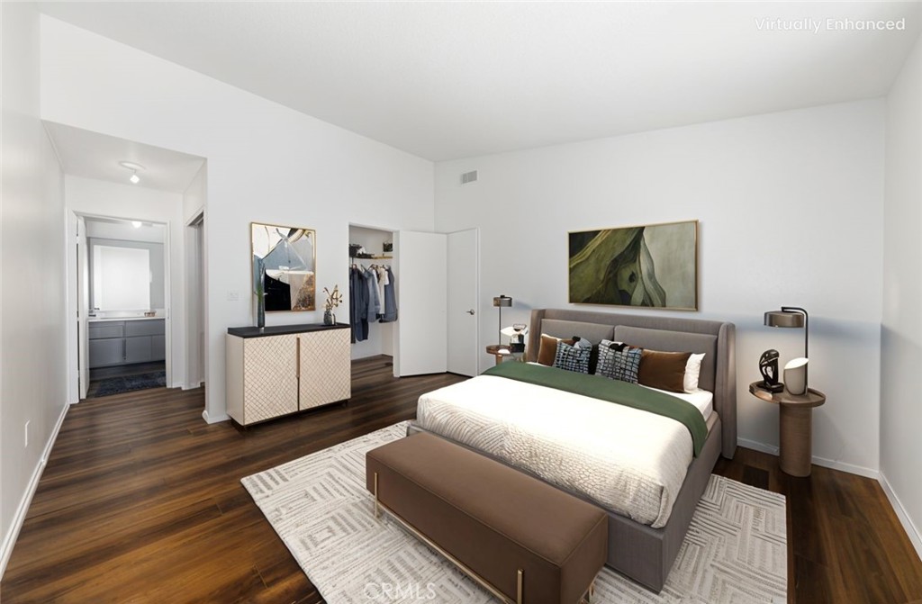 1800 East Old Ranch Road, Unit 134 Colton, CA 92324 - Photo 17 of 22 a bedroom with a bed and a couch