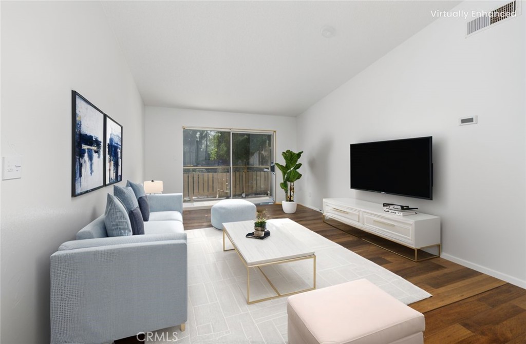 1800 East Old Ranch Road, Unit 134 Colton, CA 92324 - Photo 6 of 22 a living room with furniture and a flat screen tv