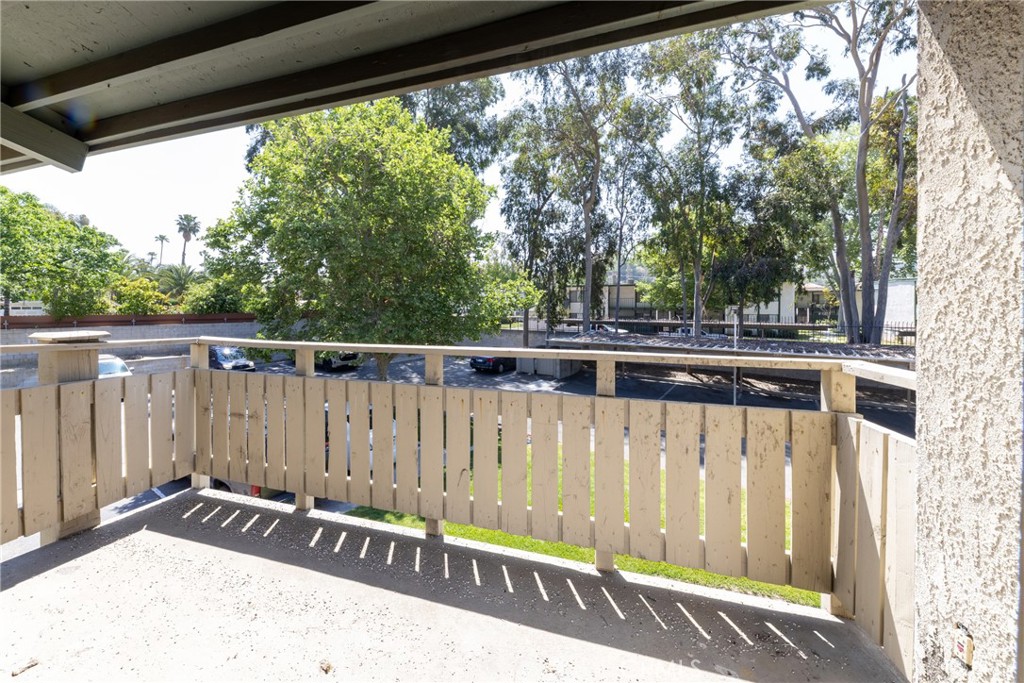 1800 East Old Ranch Road, Unit 134 Colton, CA 92324 - Photo 7 of 22 a view of a wooden fence